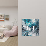 double switch plate featuring acrylic pour artwork print in blue, gray and navy by Primal Painter displayed on a wall