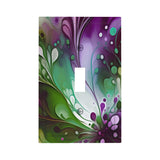 Single switch plate cover printed with an abstract design of flowing colors in plum, greens and white by Primal Painter