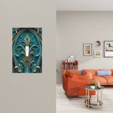 Art deco gothic medallion artwork in deep teal and gold printed on a single switch plate cover by Primal Painter on a wall