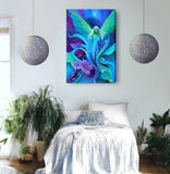 Fairy art with ethereal green wings standing among purple flowers and foliage at twilight by Primal Painter printed as a stretched canvas hanging on wall above a bed