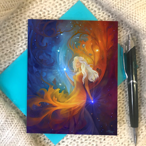 Greeting card featuring art by Primal Painter called Nebula in blue, orange, and red of a goddess with long white hair and swirls of energy against a starry sky 