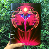 Root chakra art printed on a binder journal, angel with wings, female form, yellow starburst